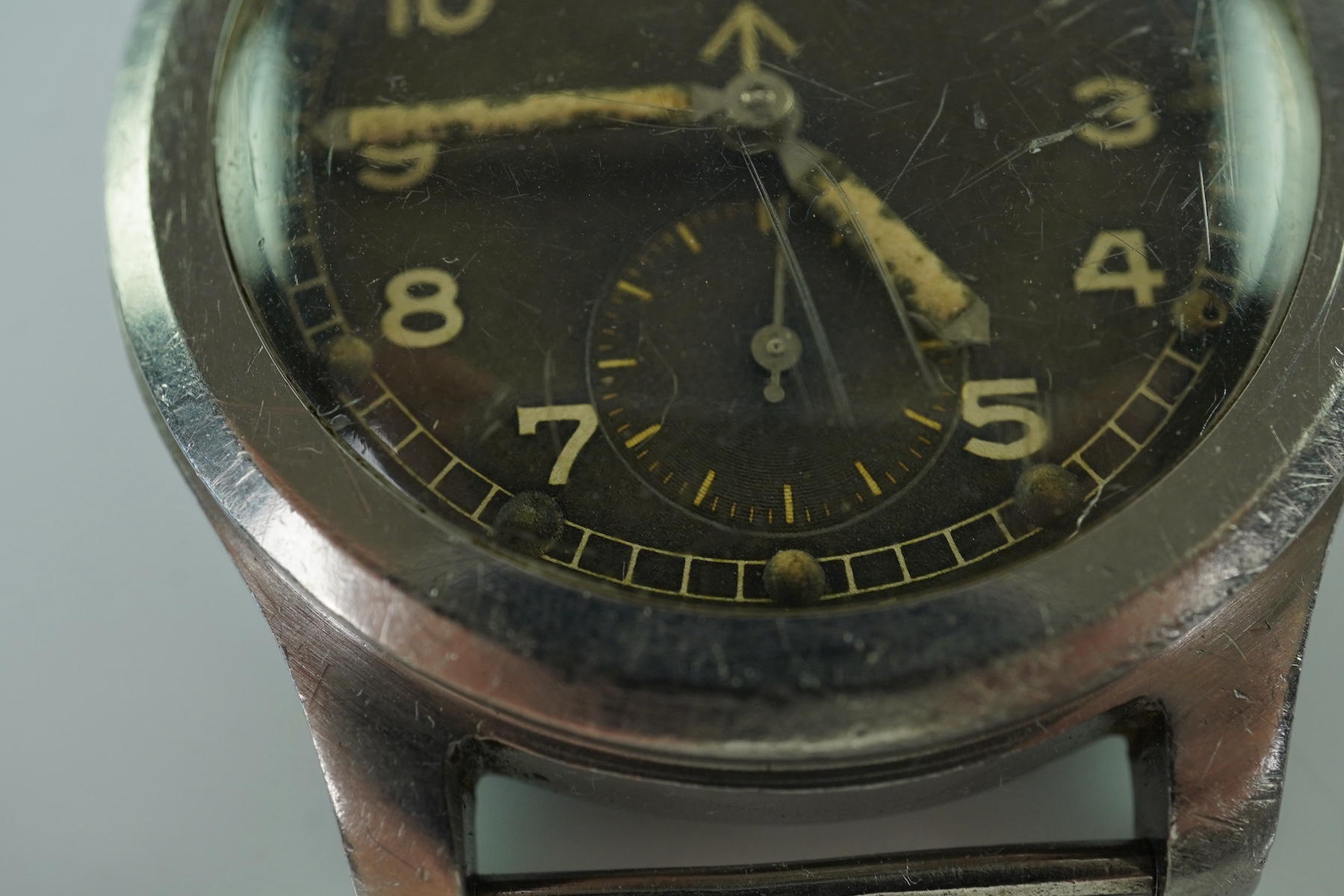 A gentleman's stainless steel Cyma W.W.W. British Military 'Dirty Dozen' manual wind wrist watch, circa 1945